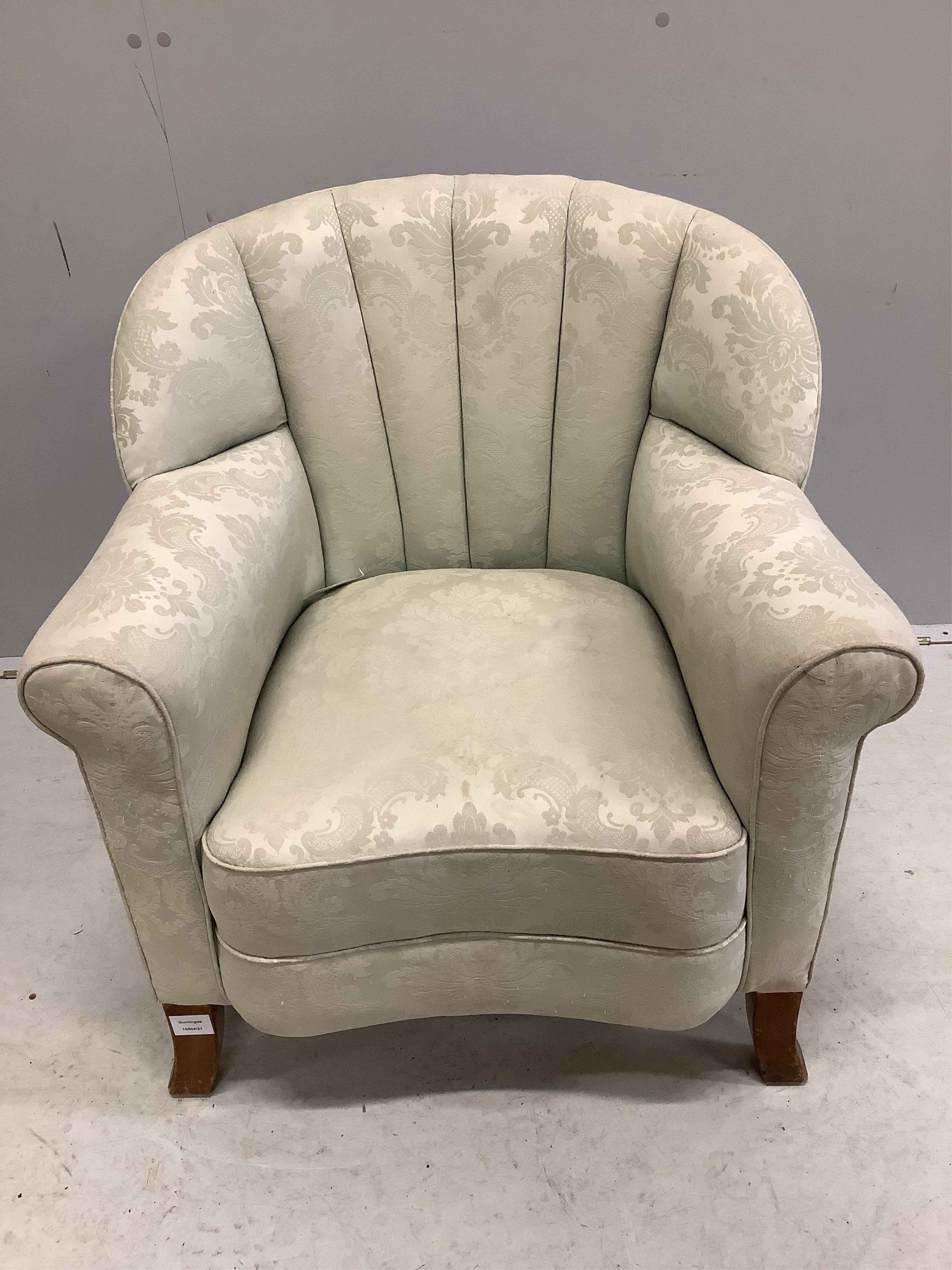 An Art Deco style upholstered tub shaped armchair, width 70cm, depth 68cm, height 76cm. Condition - fair